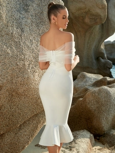 Elegant white off-shoulder mermaid dress with sheer mesh sleeves for parties