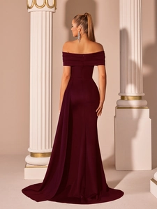 Detail view of the elegant deep red off-the-shoulder mermaid gown with long draped train