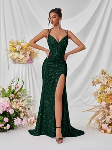 Luxurious emerald green sequin evening dress with deep V-neck and high side slit