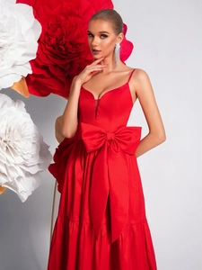 Elegant red V-neck evening gown with oversized bow and tiered pleated satin skirt