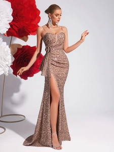 Champagne sequin evening gown with spaghetti straps, waist flower and high slit