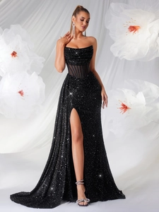 Détail du bustier à paillettes noires avec baleines transparentes sur robe de soirée