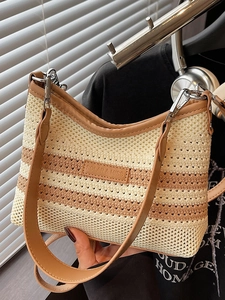 Contrast woven bucket bag with cream and coffee stripes and brown leather strap