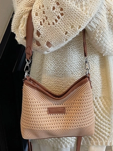 Contrast woven bucket bag with brown leather trim and silver metal clasps for women