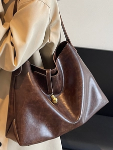 Retro brown leather tote bag with large capacity and golden gourd charm for women