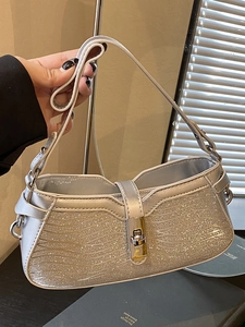 Silver sequin baguette bag with wave pattern and metallic lock for stylish women