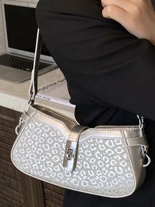 Chic silver sequin baguette bag with leopard print and metal buckle closure