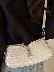 Silver sequin baguette bag with wave pattern and metallic clasp for women