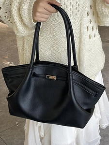 Classic black pebbled leather tote bag featuring gold twist lock and shoulder straps
