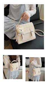 Three-way cream plaid backpack with plush bear and scarf charms shown in various styles