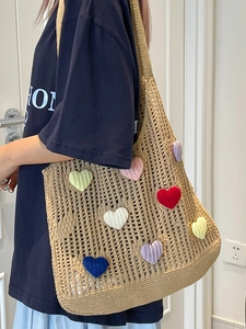 Chic hollow knit tote bag with colorful 3D heart appliques for summer beach commuting
