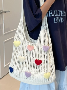 Large white knit flower tote bag for women with colorful heart crochet decorations