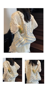 Detail of blue and white crochet tote bag featuring ruffled cloud handle and woven texture