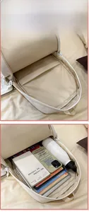 Detail view of large capacity backpack interior showing laptop compartment and main storage
