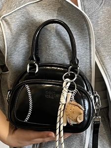 Mini black patent leather pillow bag with baseball stitching and charm set