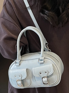 Light blue glossy PU handbag with dual front pockets and silver hardware for daily wear