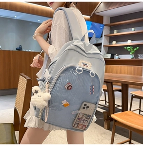 Detail of light blue Japanese style school backpack with clear PVC display pocket