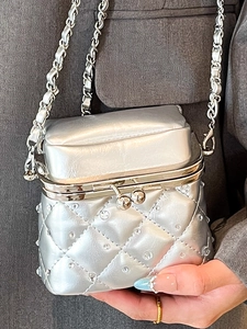 Silver quilted mini square crossbody bag with metallic rhinestones and chain strap