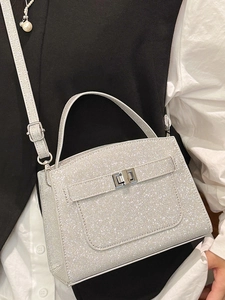 Fashionable silver rhinestone handbag with metallic finish and adjustable strap for women