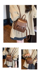 Brown vintage style backpack with 'enjoy chat zen' embossing and drawstring closure