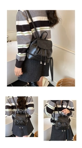 Detail view of stylish black faux leather backpack with drawstring closure and flap cover