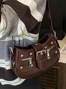 Dark brown patent leather baguette bag with silver studs and buckles for women