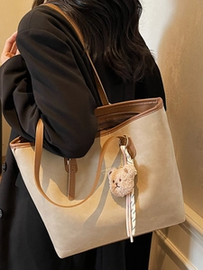 Large capacity vintage tote bag in beige suede with brown straps and plush bear charm