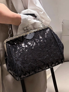 Elegante schwarze Pailletten-Handtasche mit silbernem Blumenverschluss für Abende