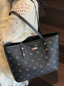 Große schwarze Tragetasche aus Kunstleder mit Hirschmuster und Logo-Platte für Damen