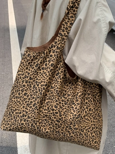 Chic leopard print canvas tote bag with large capacity and front pocket for women