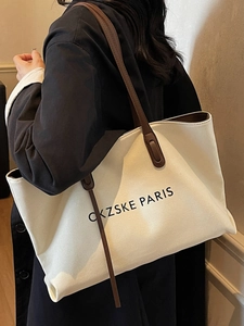 Grand sac cabas en toile avec bandoulières en cuir marron et lettrage Paris chic