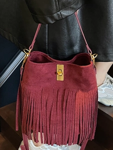 Bohemian wine red suede bucket bag with fringe tassels and gold twist lock