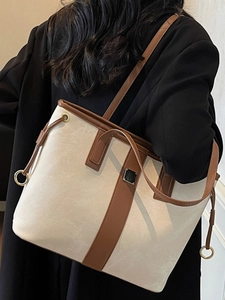 Grand sac cabas bicolore en toile beige avec détails de garniture en cuir marron