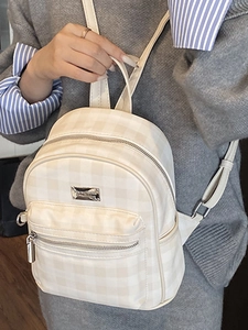 Chic beige plaid backpack for women featuring a compact design and a metal logo plaque