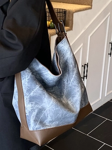 Minimalist large capacity tote bag with marble pattern texture and brown leather strap