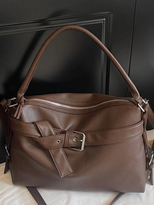 Vintage dark brown faux leather tote bag with pebble grain texture and metal buckle