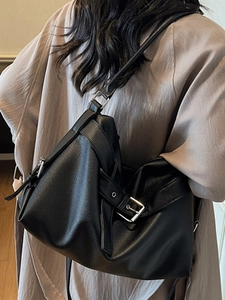 Large black lychee pattern leather tote bag with silver buckle and adjustable strap