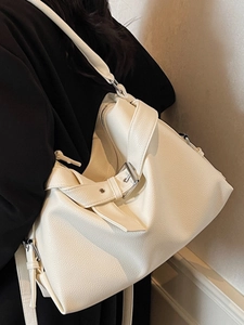 Elegant white lychee pattern tote bag with silver hardware on shoulder strap