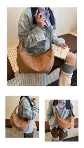 Detail view of large capacity brown suede hobo bag with adjustable shoulder strap and zipper