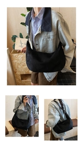 Detail of matte black crescent hobo bag featuring unique adjustable knotted shoulder strap
