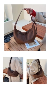 Detail of vintage brown hobo bag showing knotted shoulder strap and matte suede texture