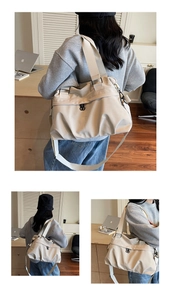 Close-up of lightweight nylon travel bag with wide handles and metal hook attachments