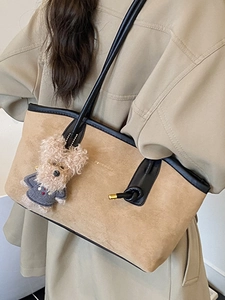 Khaki suede tote bag with black leather straps and a cute teddy bear charm for women