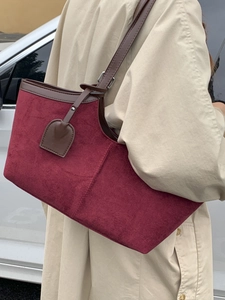Chic burgundy suede tote bag for women with brown leather straps for daily commute