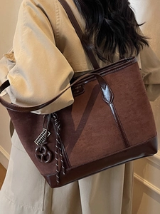 Retro large-capacity tote bag in dark brown suede with stylish creative pendants