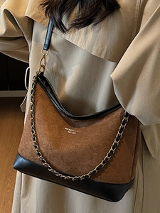 Retro brown suede shoulder bag with black leather base and stitching for women