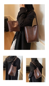 Vue détaillée du sac cabas marron vintage avec pochette intérieure zippée amovible
