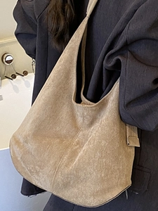 Minimalist large khaki suede tote bag in a classic hobo silhouette for daily commute