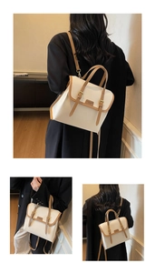 Detail of cream and brown vintage tote bag showing versatile handle and backpack straps