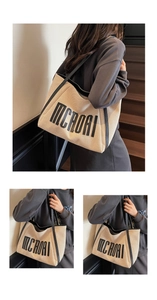 Détail du sac fourre-tout en toile avec poignées en cuir noir et patch MCROAI